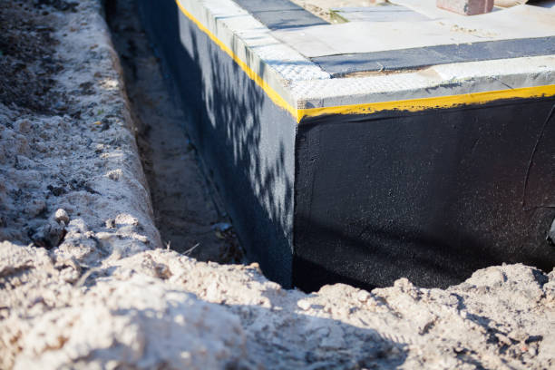 Professional Waterproofing technician working in Ney, OH
